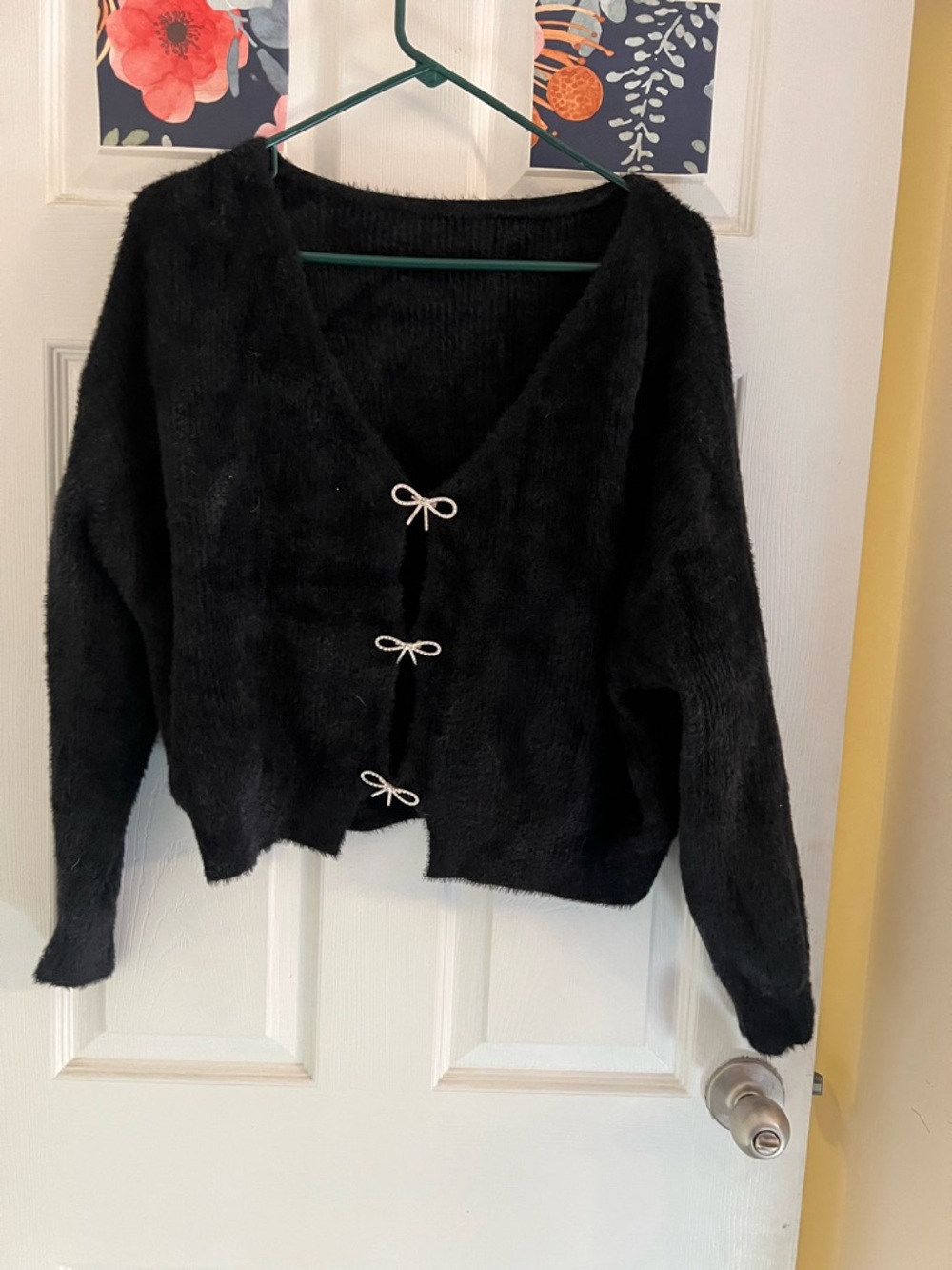 Black Fuzzy V-Neck Sweater with Bow Closures